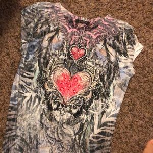 Large well designed shirt but fits like a small